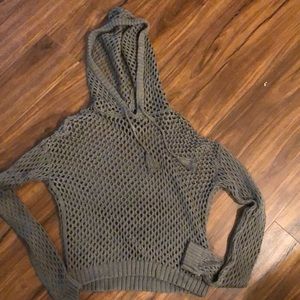 green knitted sweatshirt